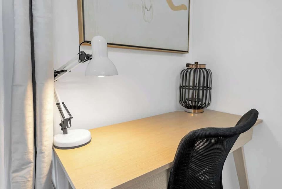 A desk in the second bedroom makes it easy to work remotely.