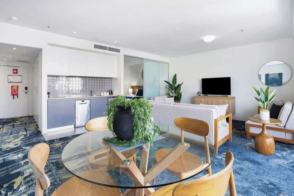 Gather around the dining table for four, ideal for sharing meals and making memories.
