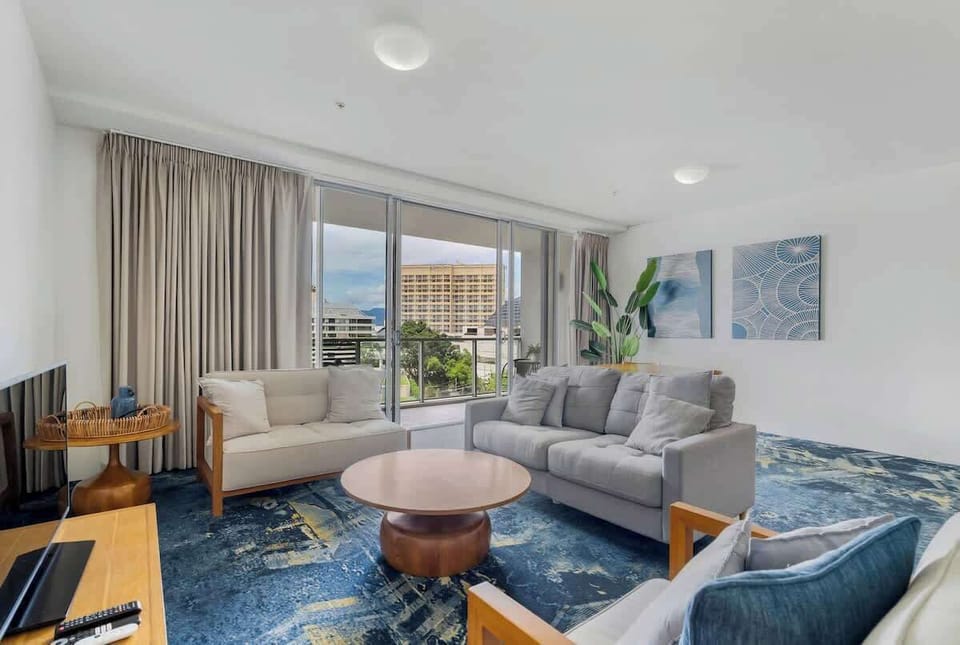 Experience the comfort of the spacious living area, featuring modern furnishings and abundant natural light.