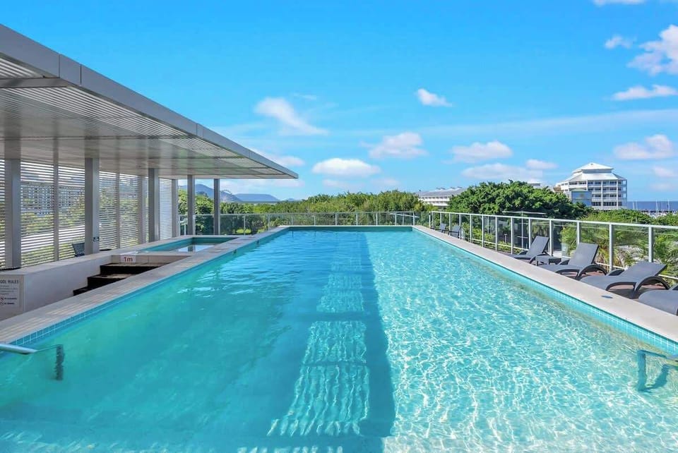 Enjoy a swim in the scenic pool, an ideal way to unwind after a day exploring Cairns.