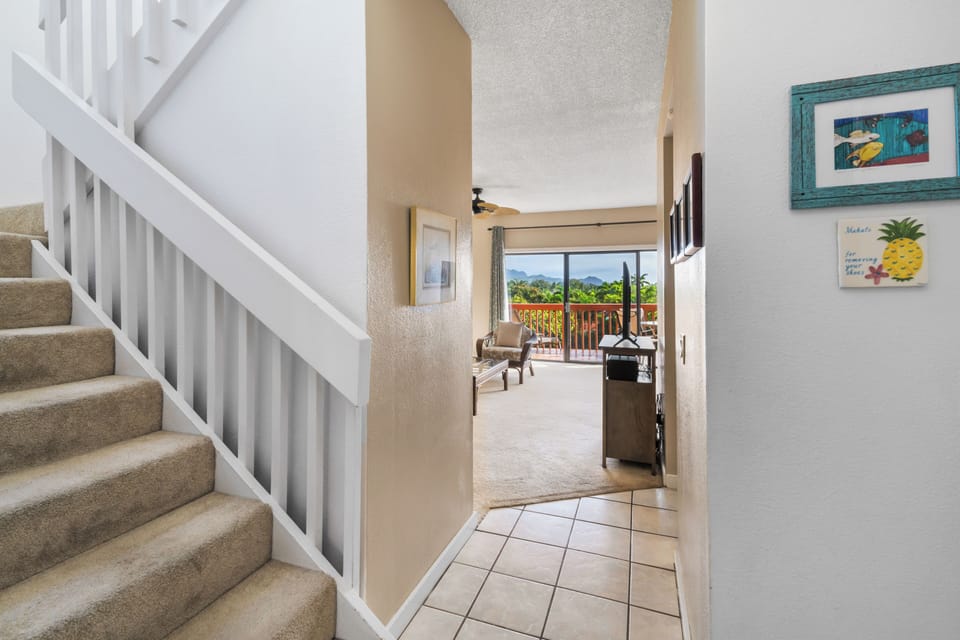 Step inside and discover a bright, welcoming entrance leading to your private balcony with stunning mountain views—perfect for morning coffee or evening relaxation.