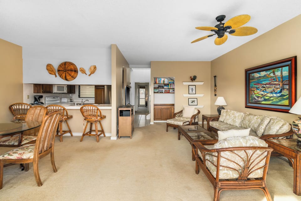 Relax in your open-concept tropical retreat with island-inspired furnishings, a fully equipped kitchen, and coastal artwork that brings Hawaii's charm indoors.