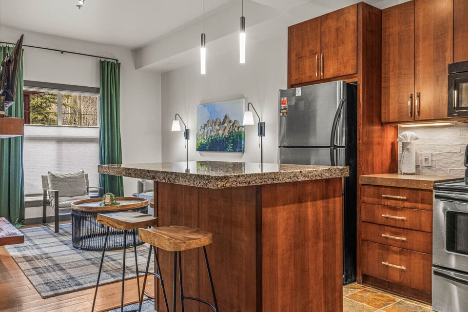 More than enough room to sit around the island for meals (prep) and socialize
