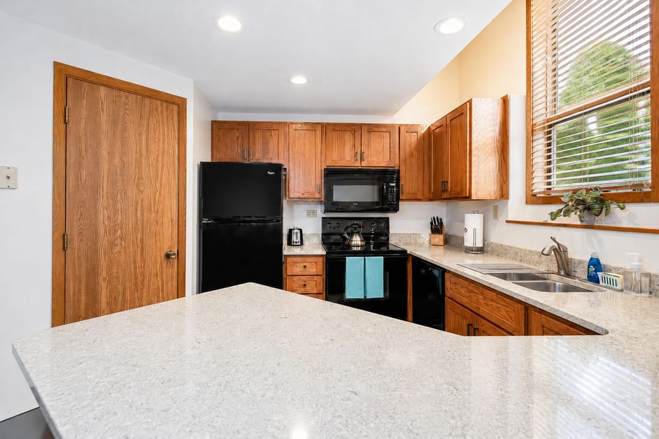 Spacious kitchen with laundry closet attached
