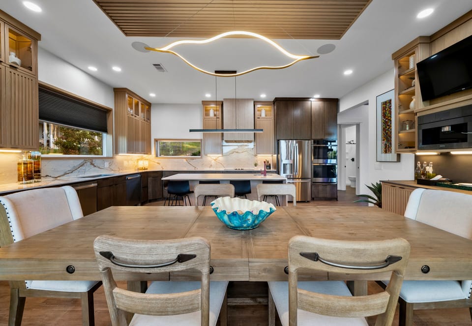 Gather 'round this inviting dining area, a perfect blend of form and function. Every meal here comes with a side of scenic lake views