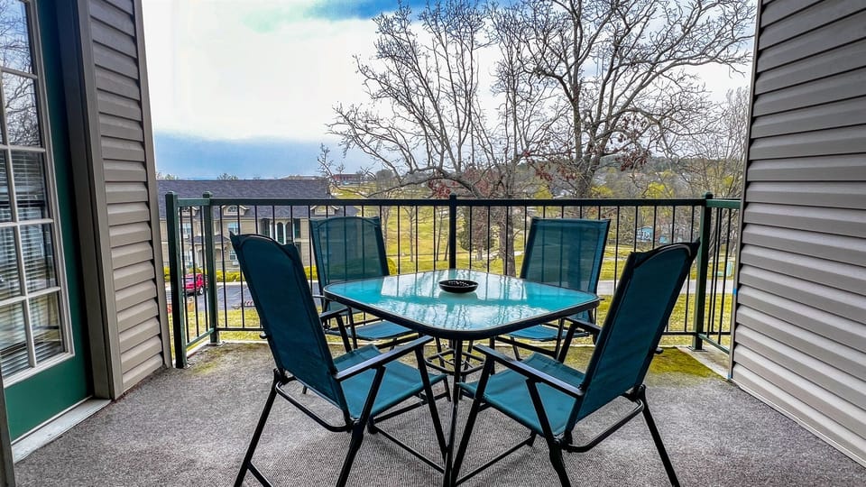 Relaxing deck with nice view of the golf course.