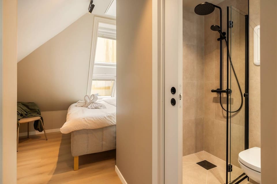 Bright bedroom with private ensuite shower bathroom for ultimate comfort