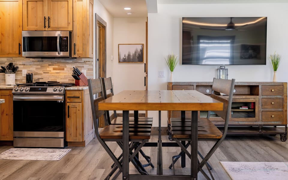 Open kitchen, dining and living areas.