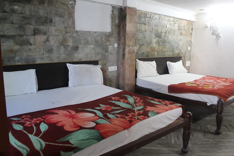 Family Quadruple Room, City View | Down comforters, pillowtop beds, individually decorated
