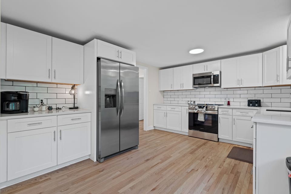 Completely stocked kitchen complete with coffee bar. 