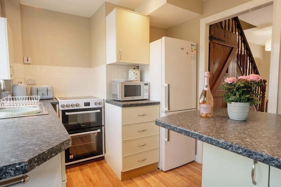 The Kitchen: with all kitchen amenities available in this space, you can easily self cater whilst staying at Rowan Cottage.