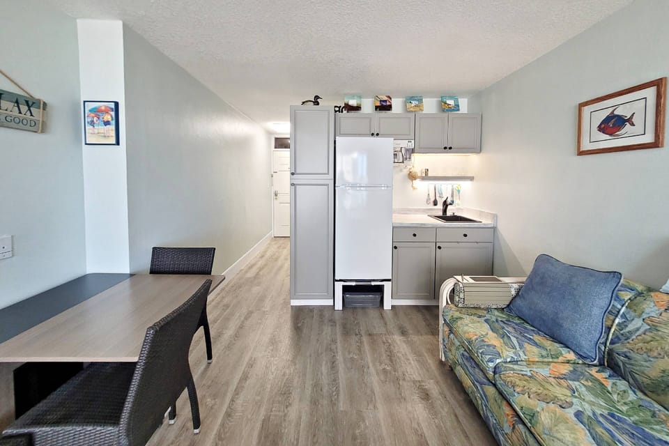 Unit includes a table top that sits 4 people to gather around for meals and/or play table top games and cards.