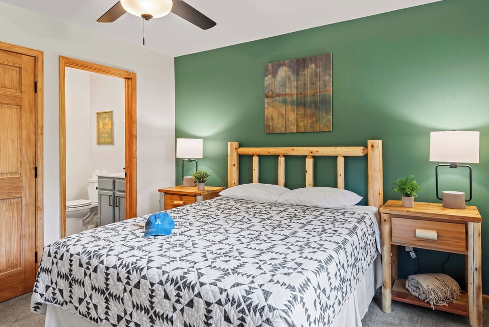 The primary bedroom features a queen bed.