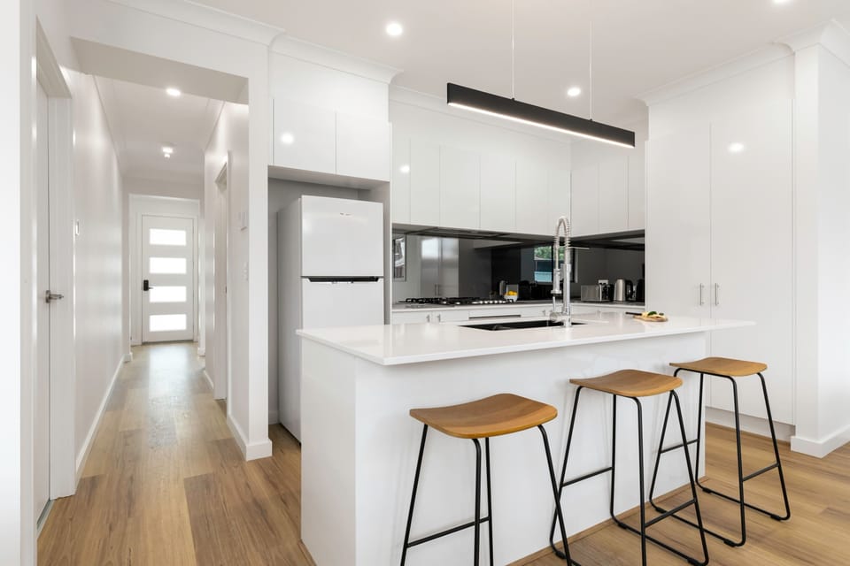 Kitchen and hallway to entrance