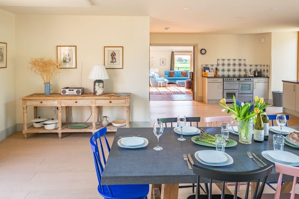 Ground floor: Dining area looking past the kitchen and into the sitting room