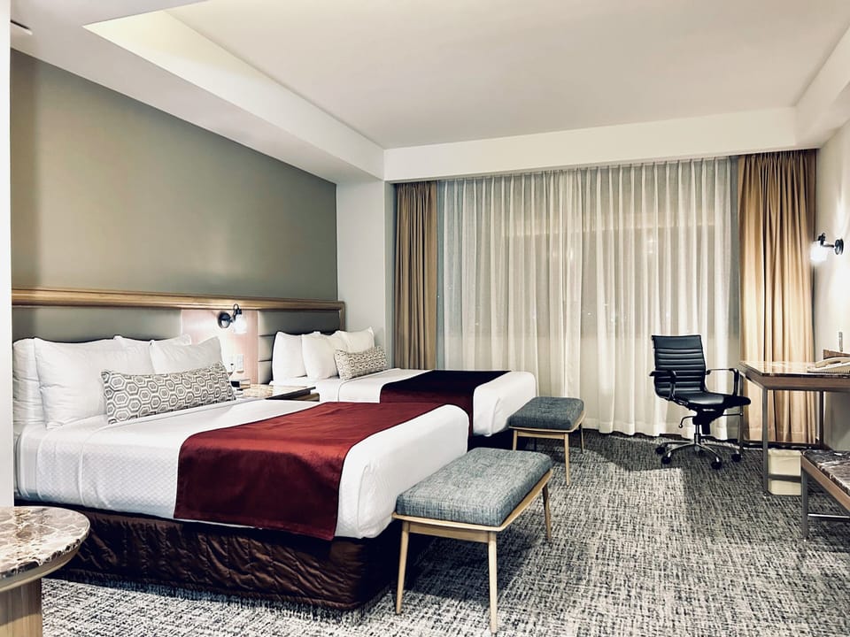 Standard Room, 2 Double Beds | In-room safe, desk, soundproofing, iron/ironing board