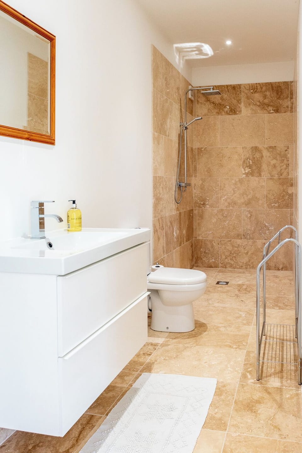 The luxurious wet room shower is newly fitted