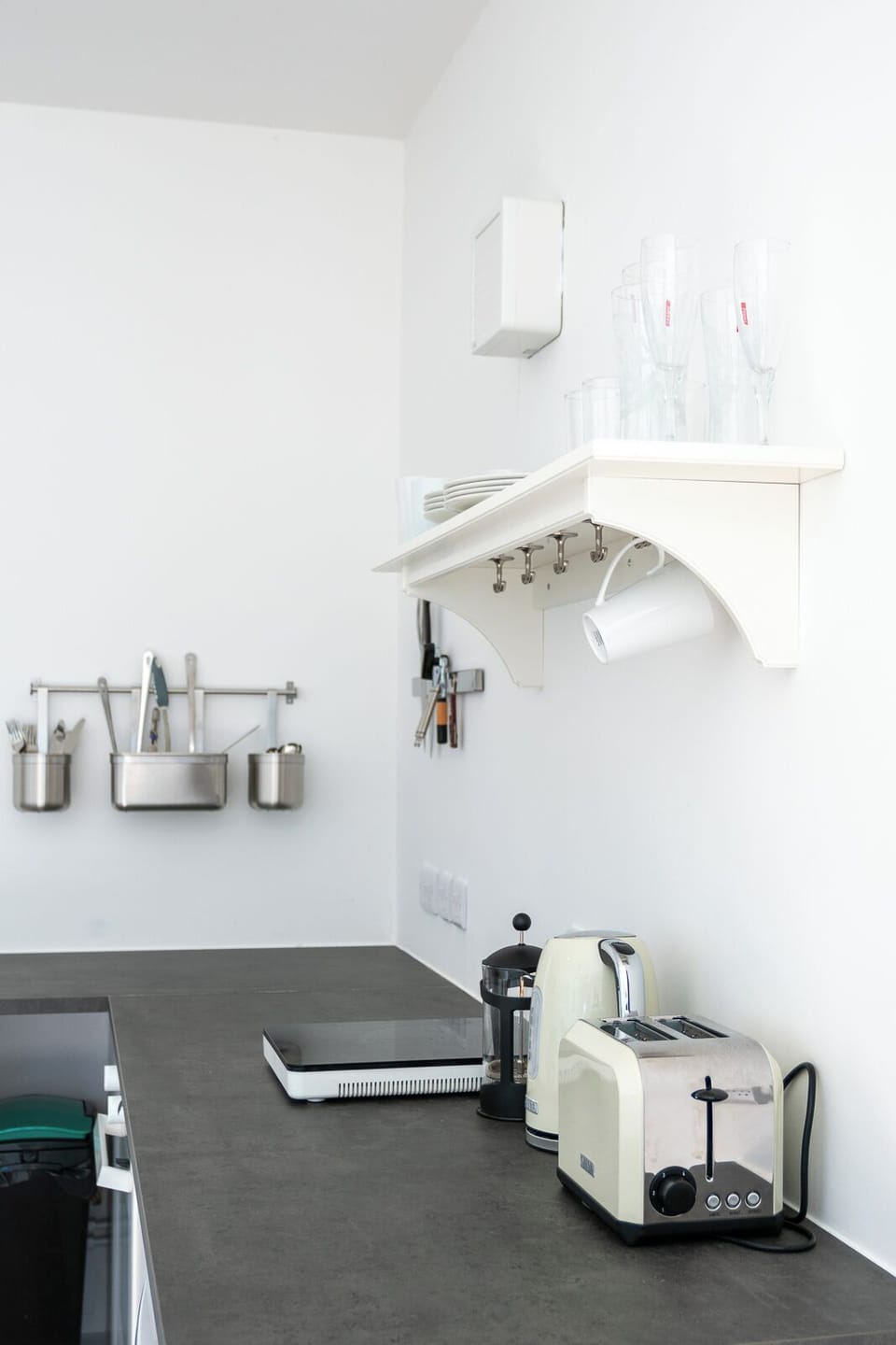 The kitchen is equipped with appliances all the essential equipment