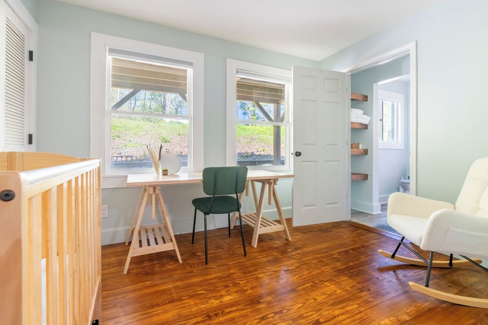 There is a large desk for WFH, crafts, and changing any necessary diapers. 