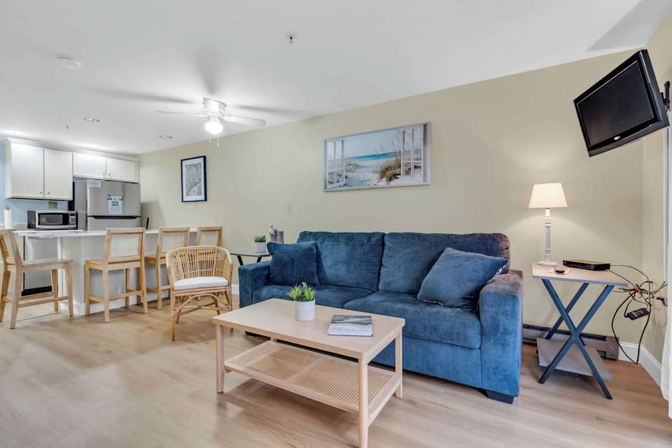 Condo, 1 King Bed with Sofa bed, Balcony (All is Wells) | Living area | 42-inch flat-screen TV with digital channels