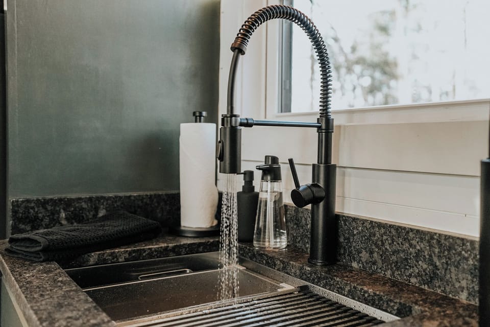 High quality sink hardware, organic dish soap, and organic hand soap.