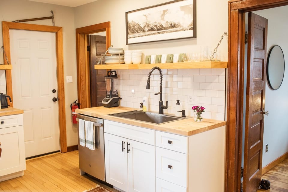 Bright, modern kitchen with farmhouse charm and open shelving