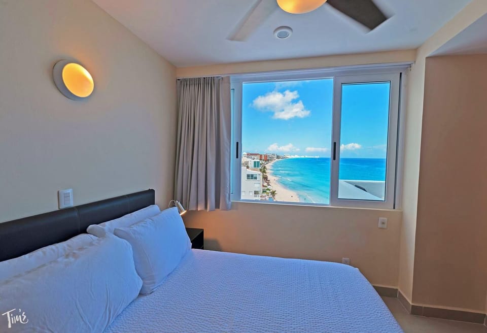 Penthouse 1 of 2 - BR4 has a queen bed, ocean/beach view and attached bathroom with shower.