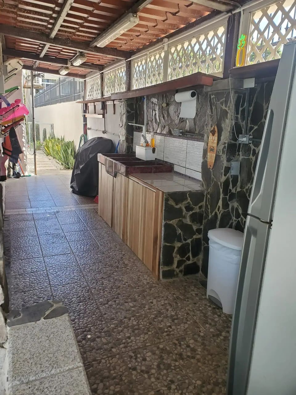 BBQ area with gas grill and extra fridge