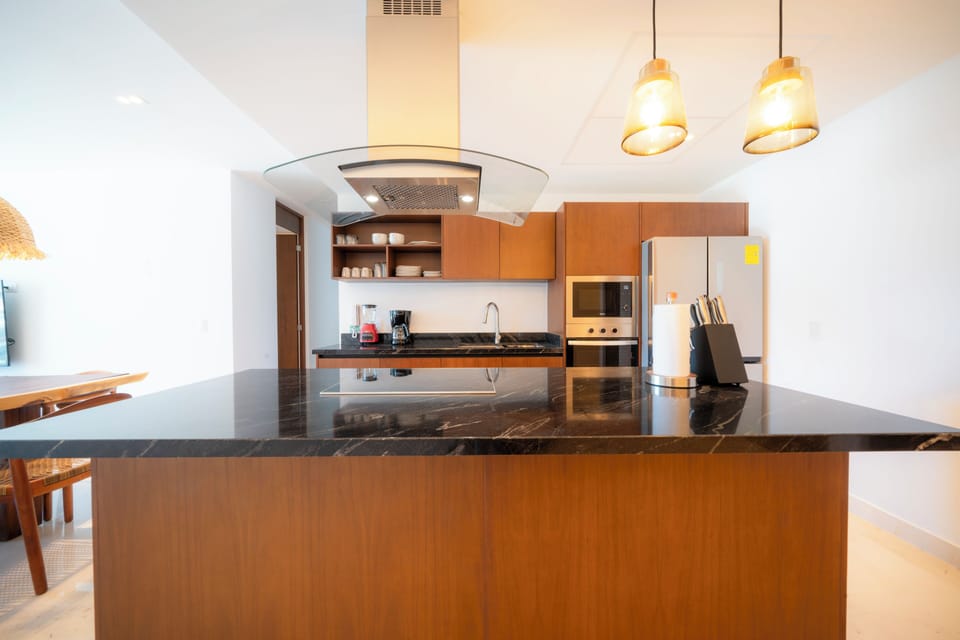 Deluxe Apartment, 3 Bedrooms | Private kitchen | Full-size fridge, microwave, toaster