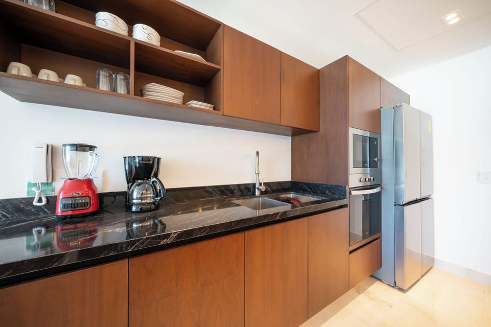 Deluxe Apartment, 3 Bedrooms | Private kitchen | Full-size fridge, microwave, toaster