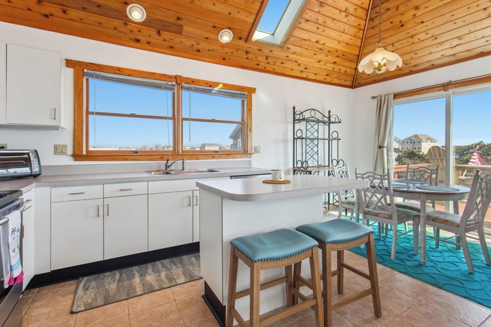 The Kitchen Island offers prep space and additional seating.