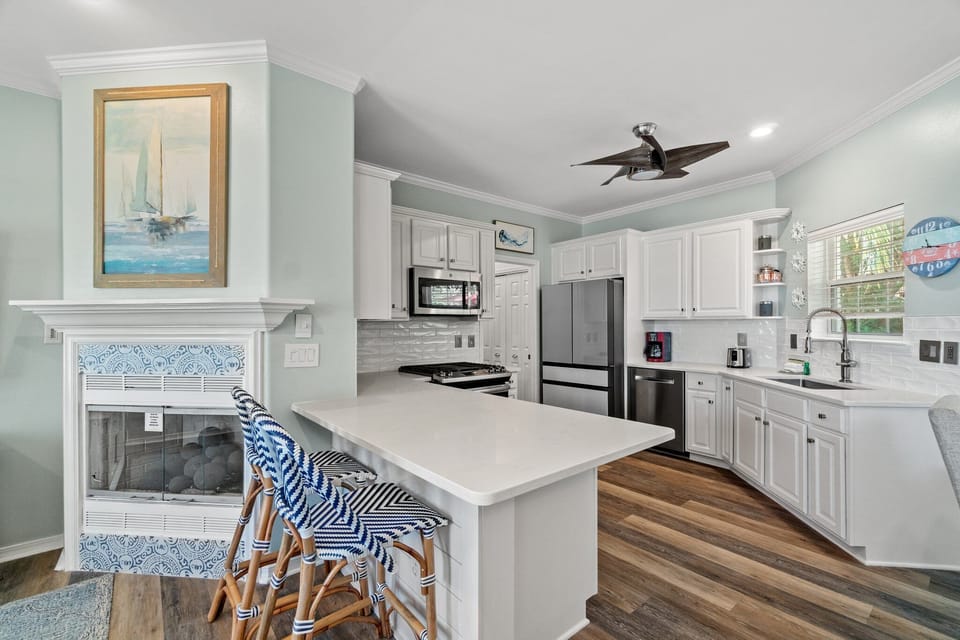 Spacious Kitchen With Bar Seating