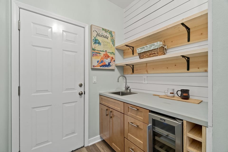 Bar Area With Wine Cooler Next To Kitchen