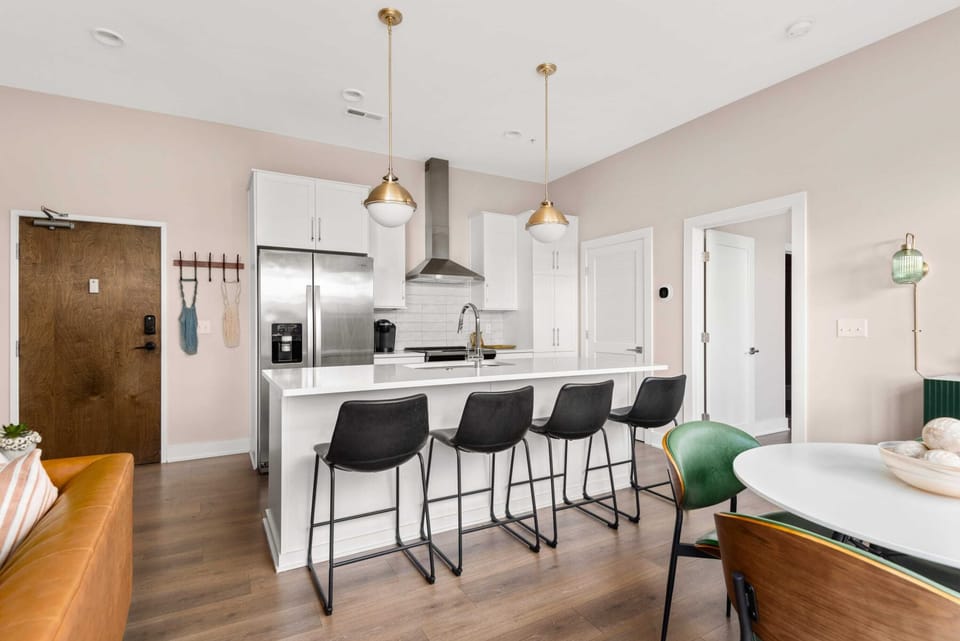 Our full kitchen with island seating invites you to cook, connect, and celebrate every meal.