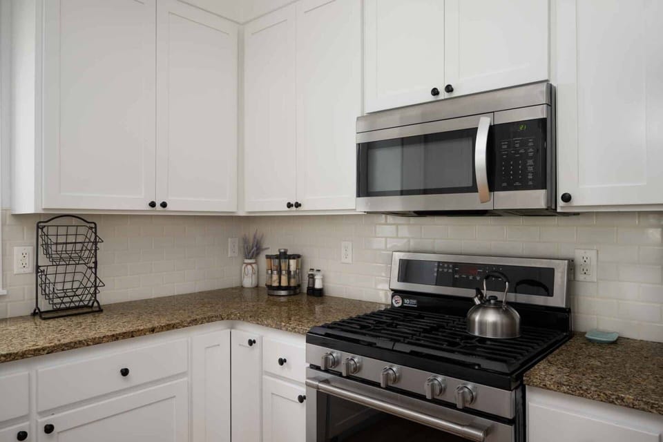 The kitchen has ample counter space and up to date appliances.