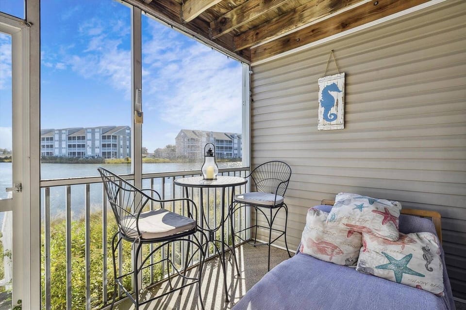 Relax on the screened-in porch with gorgeous water views.