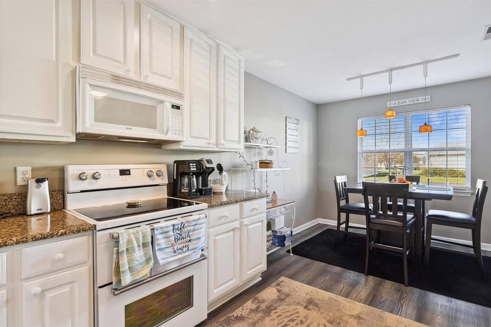 Fully stocked kitchen with both drip and k-cup coffee pot.