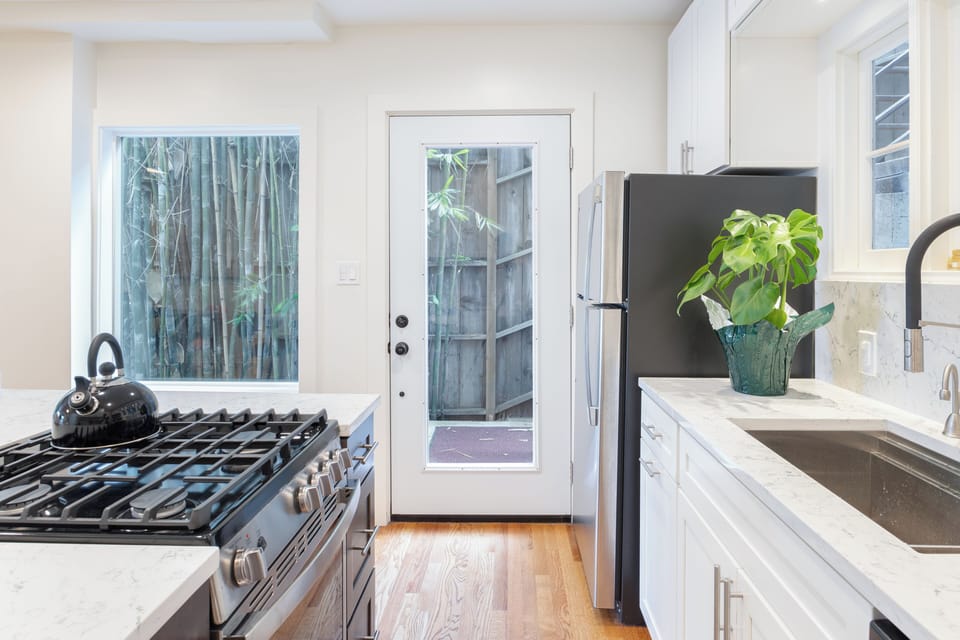 Whip up some culinary delights in this modern and bright kitchen.