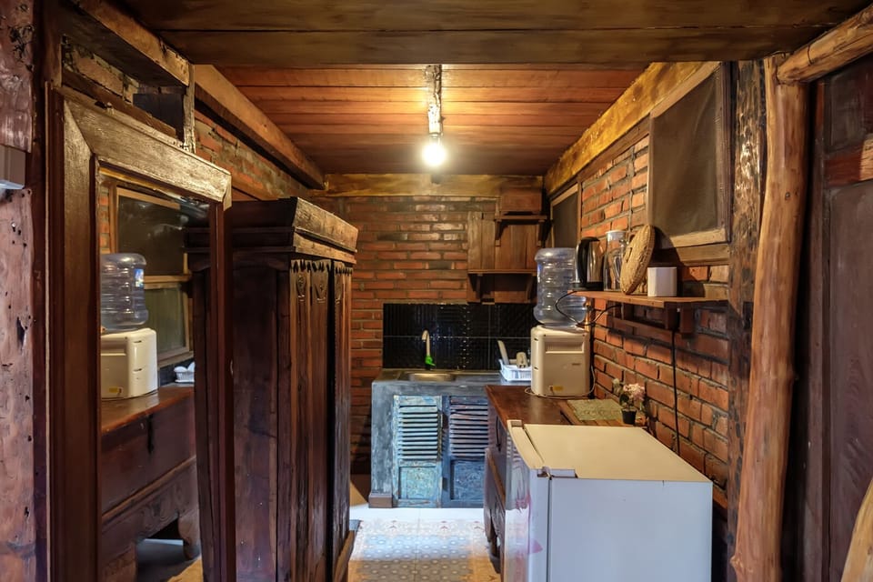 Deluxe Quadruple Room | Private kitchen