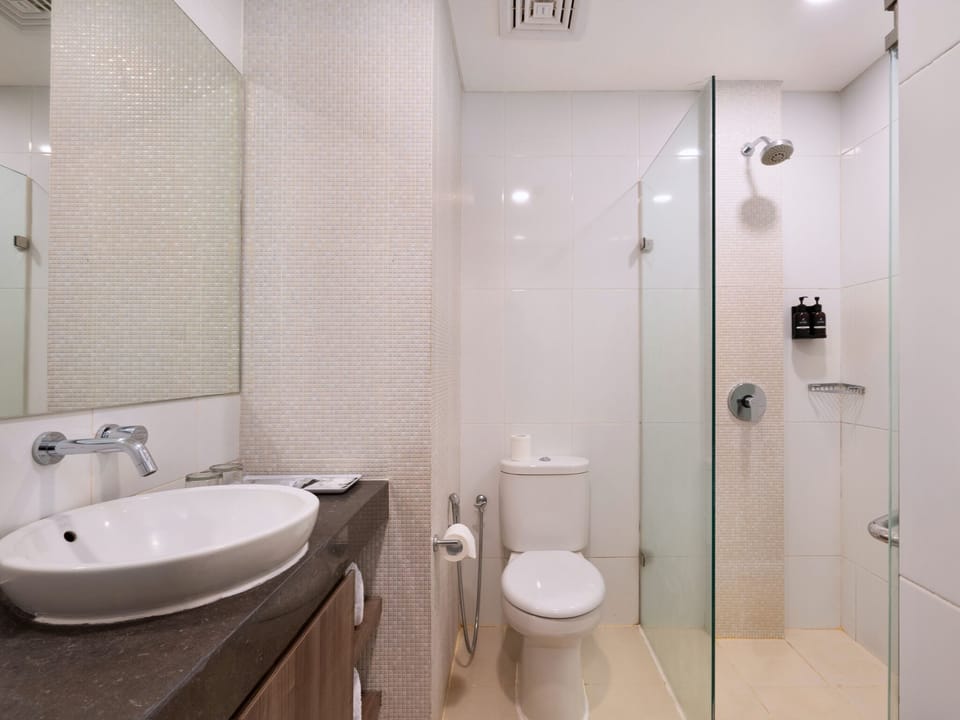 Shower, slippers, bidet, towels