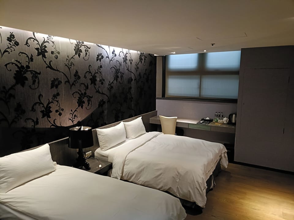 Deluxe Triple Room | Down comforters, bed sheets