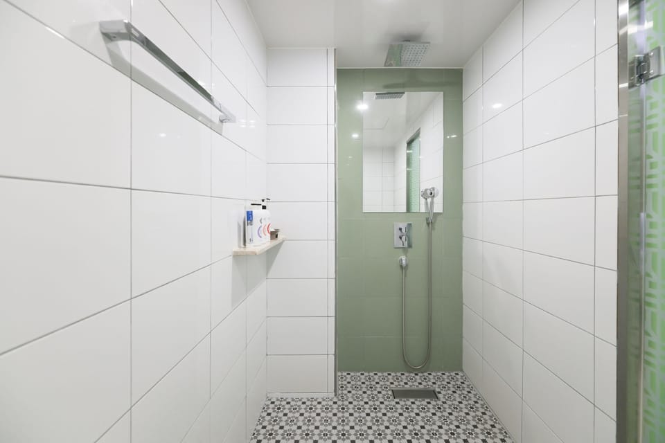 Premium Family Twin | Bathroom | Free toiletries, hair dryer, bathrobes, slippers
