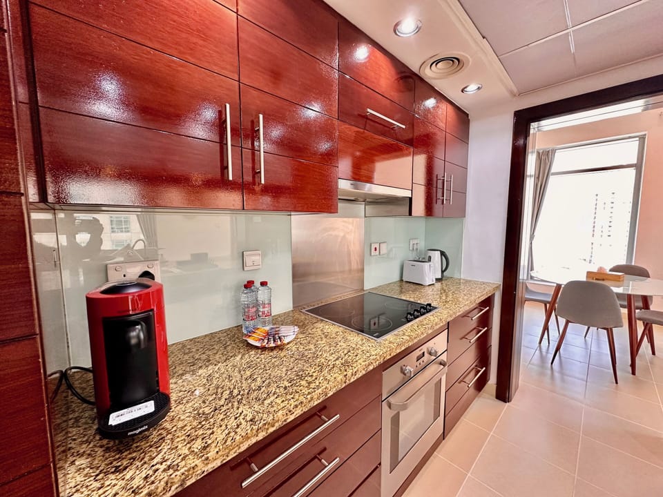 Family Apartment, Balcony, City View | Private kitchen | Fridge, microwave, oven, stovetop