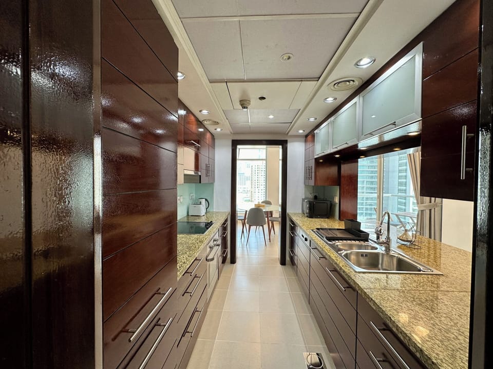 Family Apartment, Balcony, City View | Private kitchen | Fridge, microwave, oven, stovetop