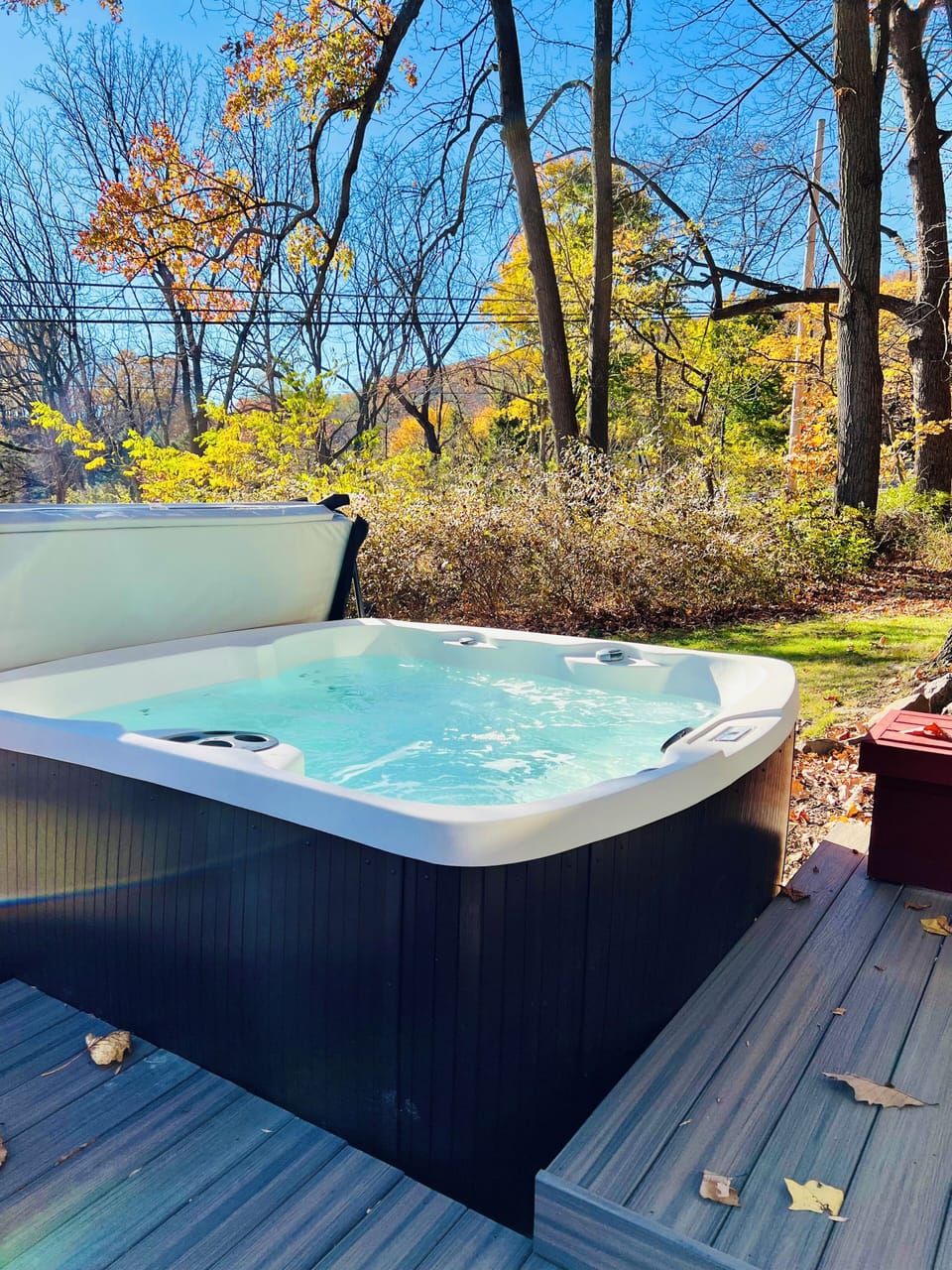 Outdoor hot tub. Relax with 65 jets, LED lighting and body lounger. 