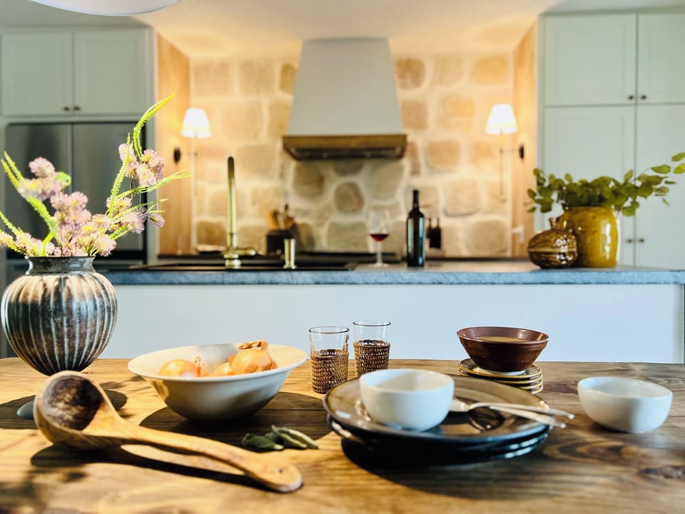 Pop a bottle of wine and host a beautiful, candlelit dinner party