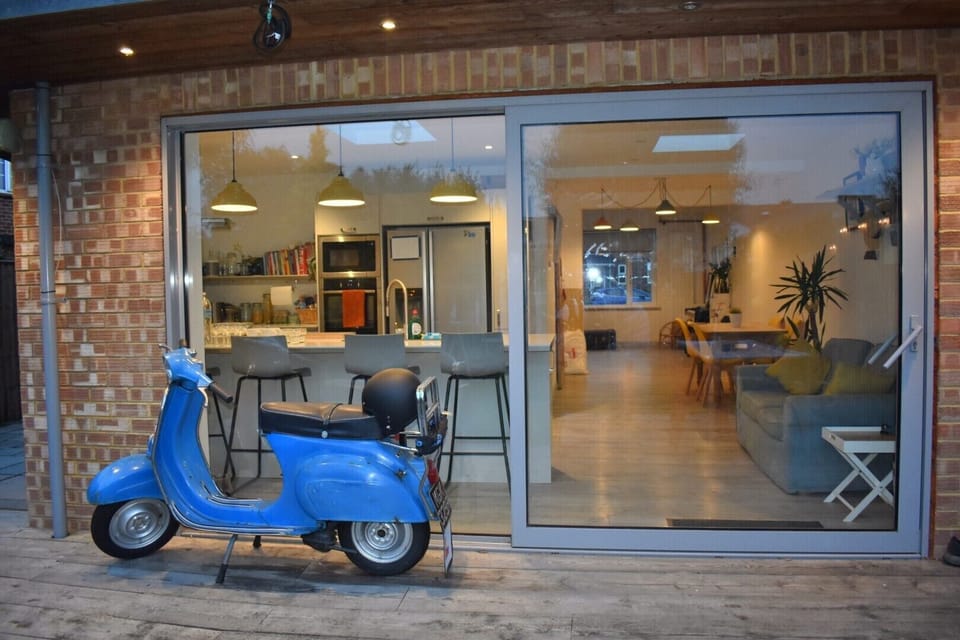 Large patio doors lead out to the garden