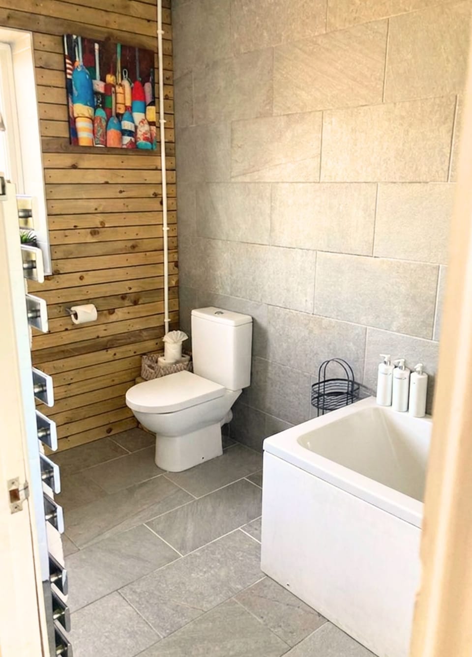 Family bathroom with bathtub and shower