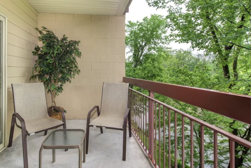 2 Bedroom Pigeon Forge Vacation Condo Rental Cedar Lodge 204 - Private Balcony with a River View from your Pigeon Forge Condo