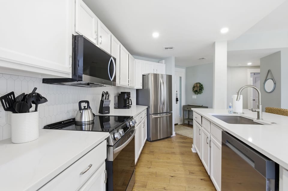 Your fully-equipped kitchen awaits with stainless steel appliances, granite countertops, and everything you need to create memorable meals during your stay.